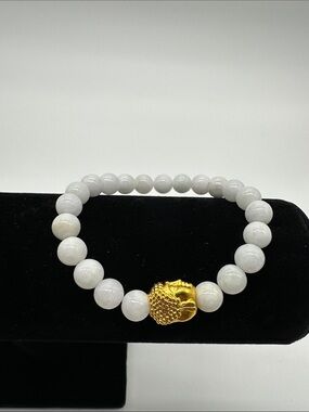 White Jade Bracelet with Gold Buddha Accent
